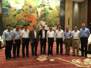 Andy Marsh with university representatives in China